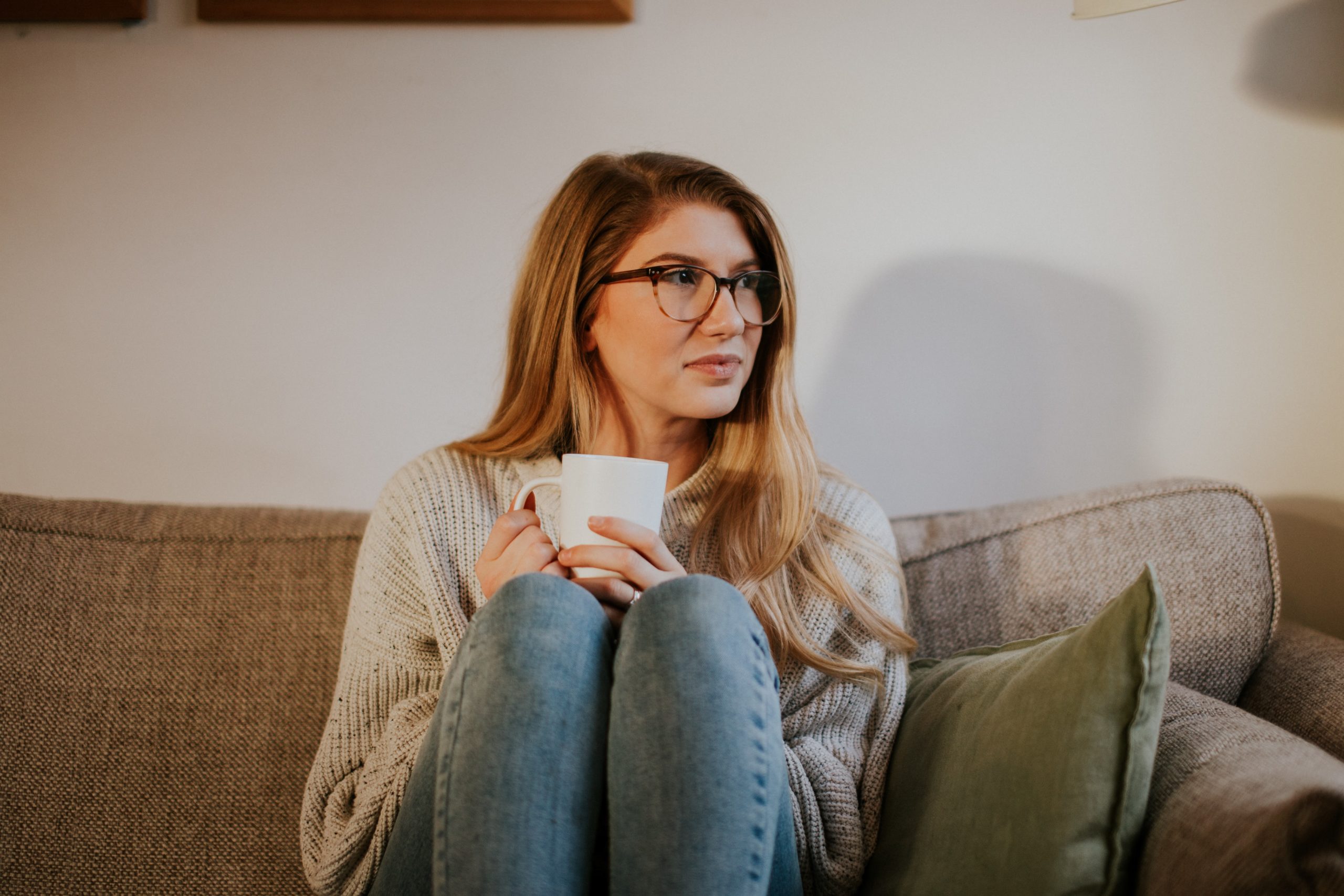 Woman thinking about whether she should be concerned about spotting or bleeding