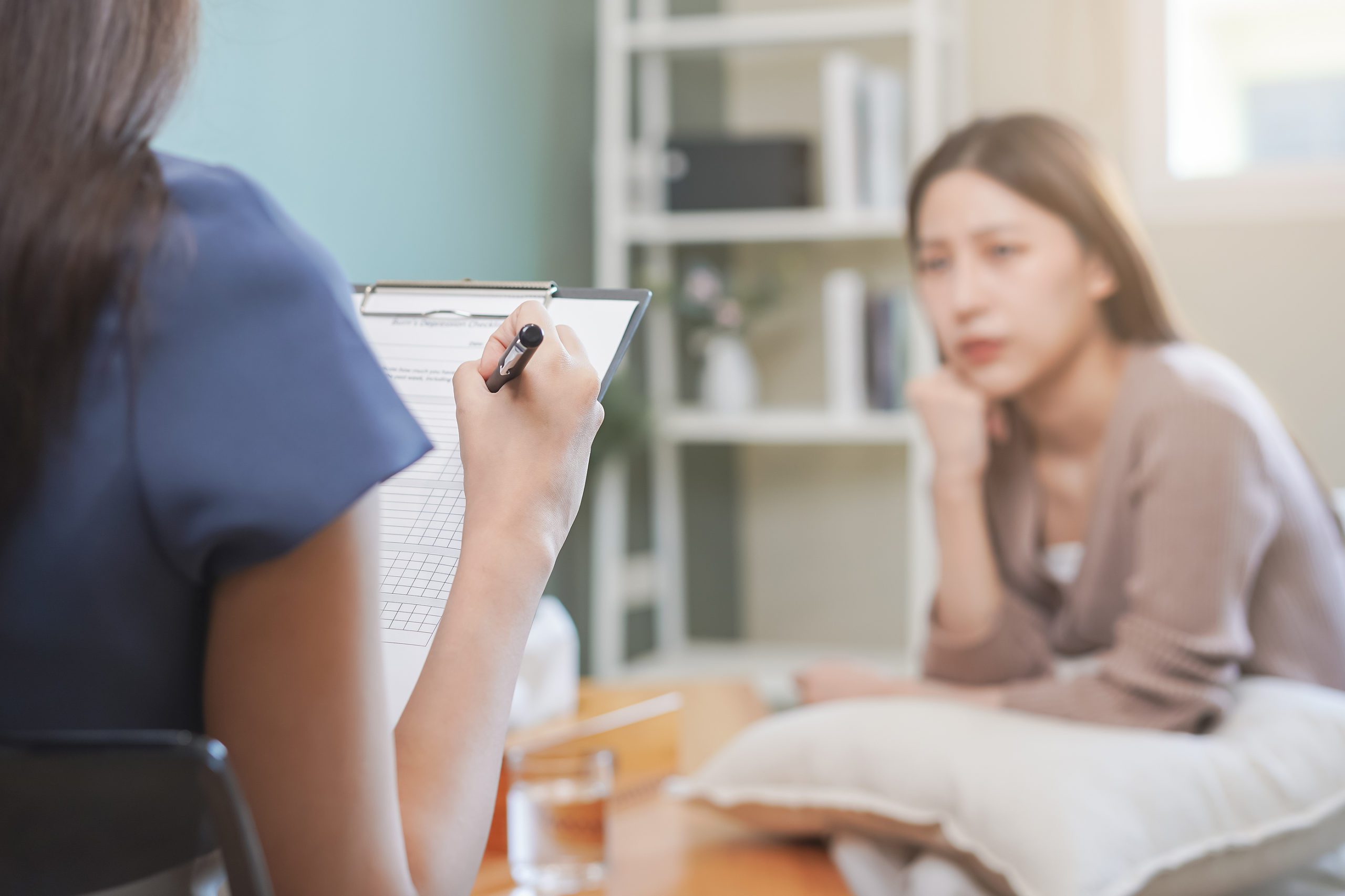 Psychology, Depression. Sad, Suffering Asian Young Woman Consult