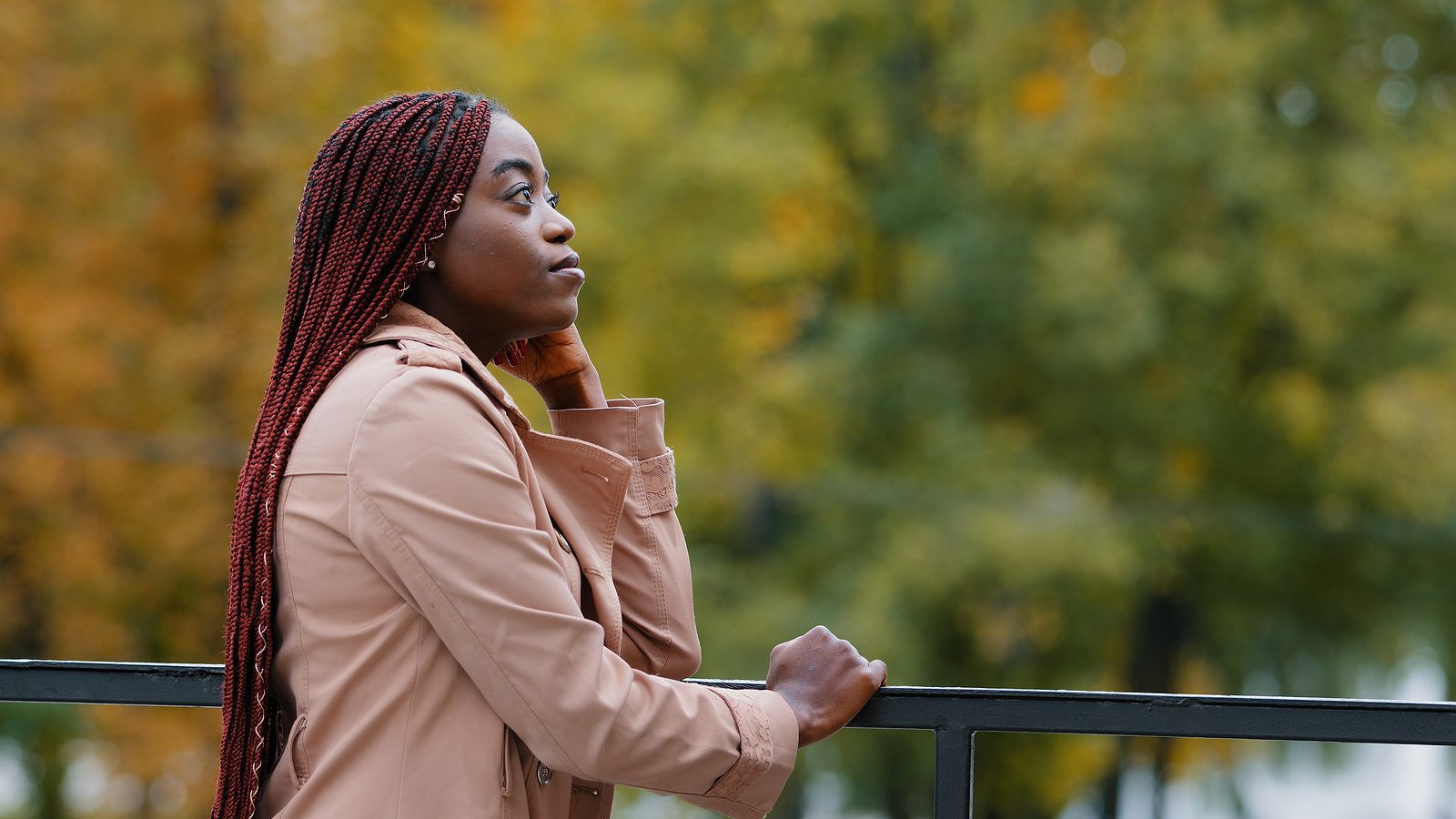 Thoughtful Pensive Upset Young Woman Stands Outdoors Looking To